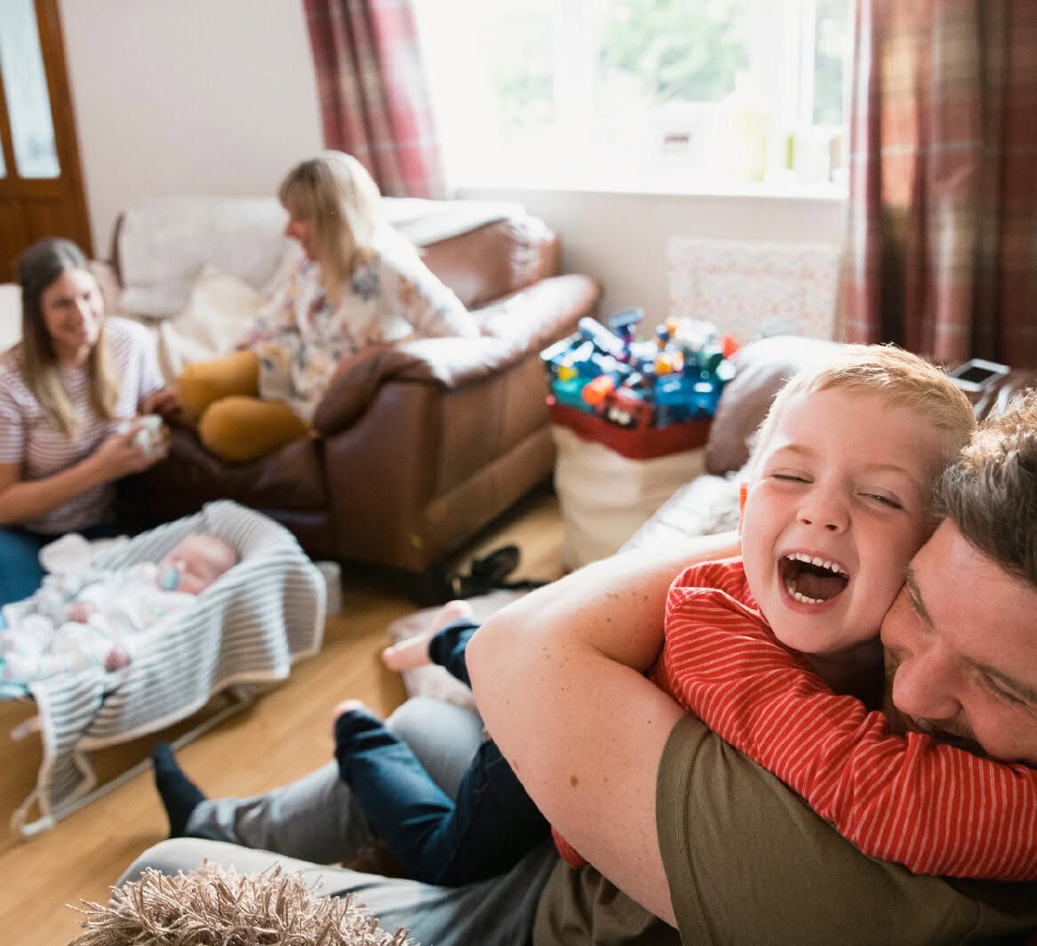 dad and son hugging